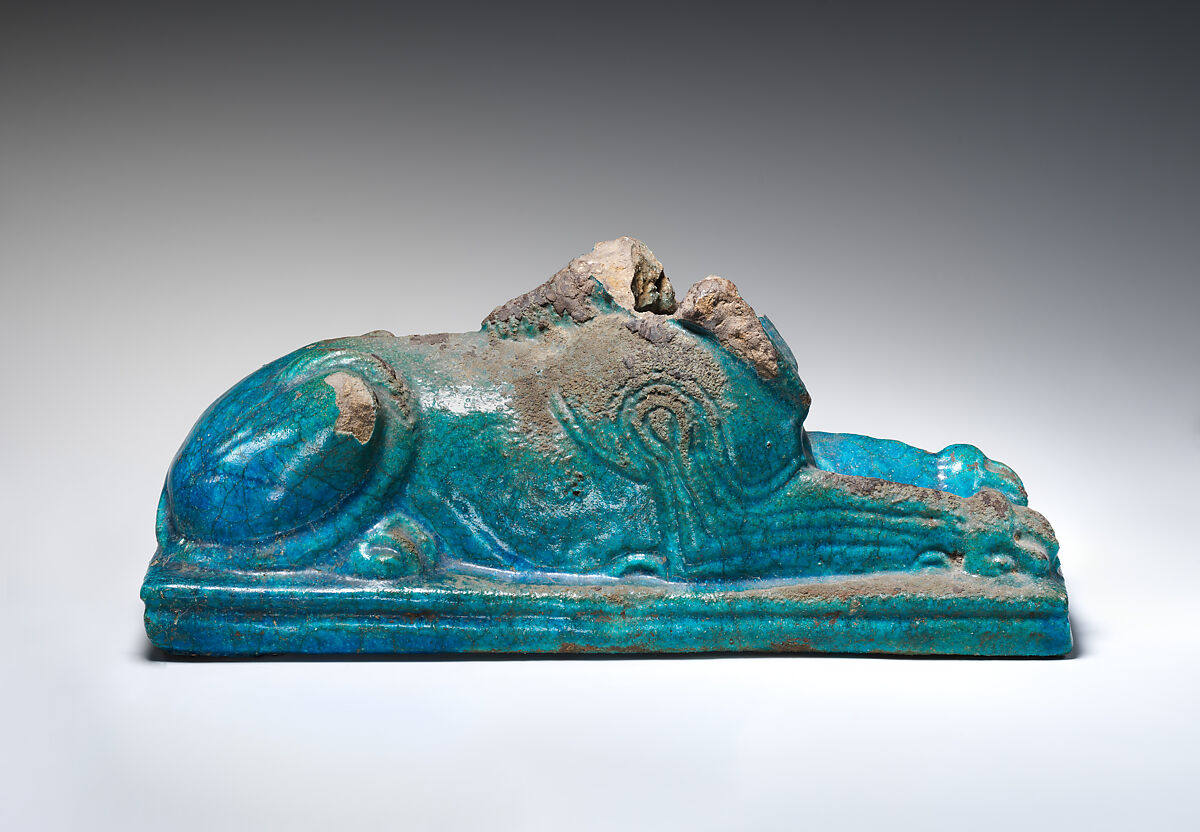 Sphinx with head broken away, Faience