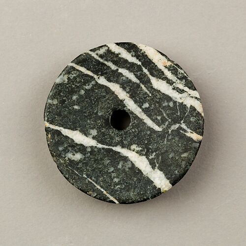 Disc-shaped mace head
