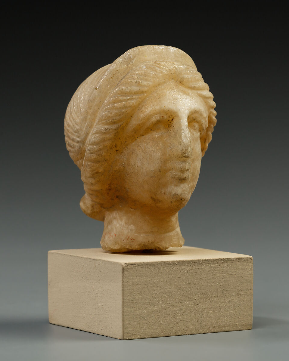 Head, female, Travertine (Egyptian alabaster)