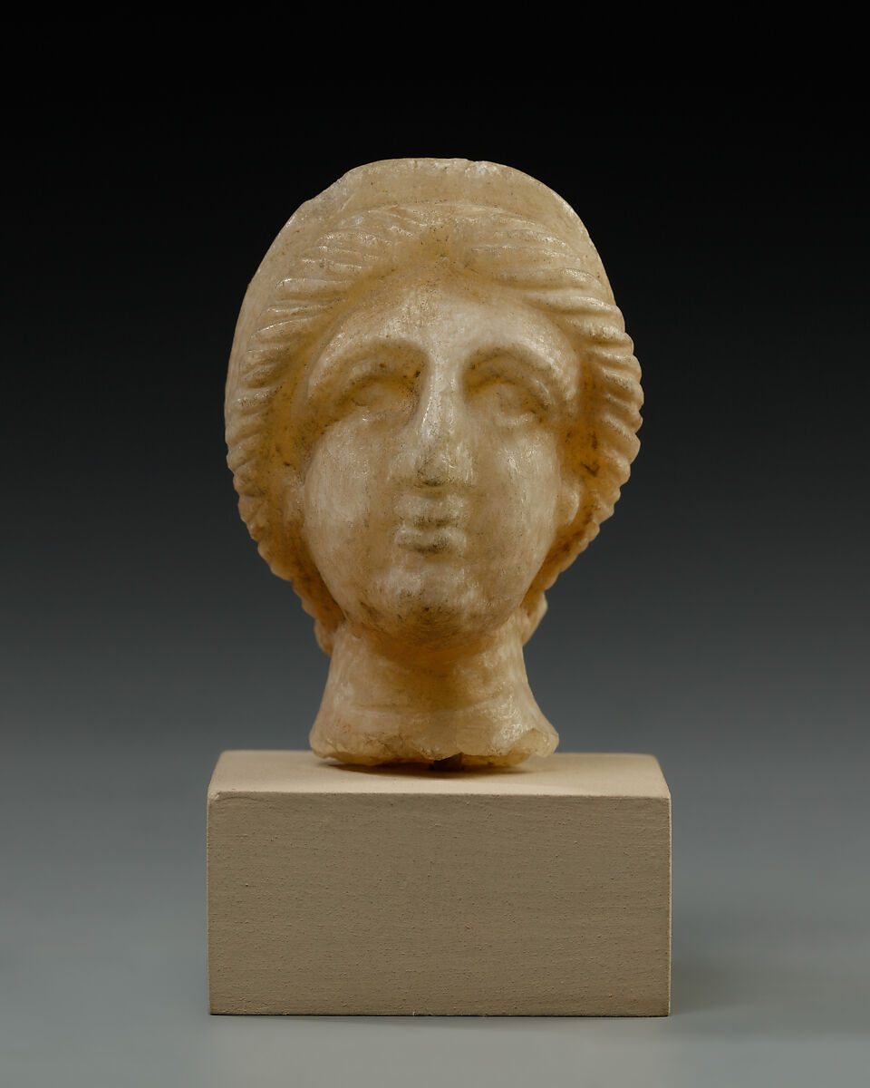 Head, female, Travertine (Egyptian alabaster) 