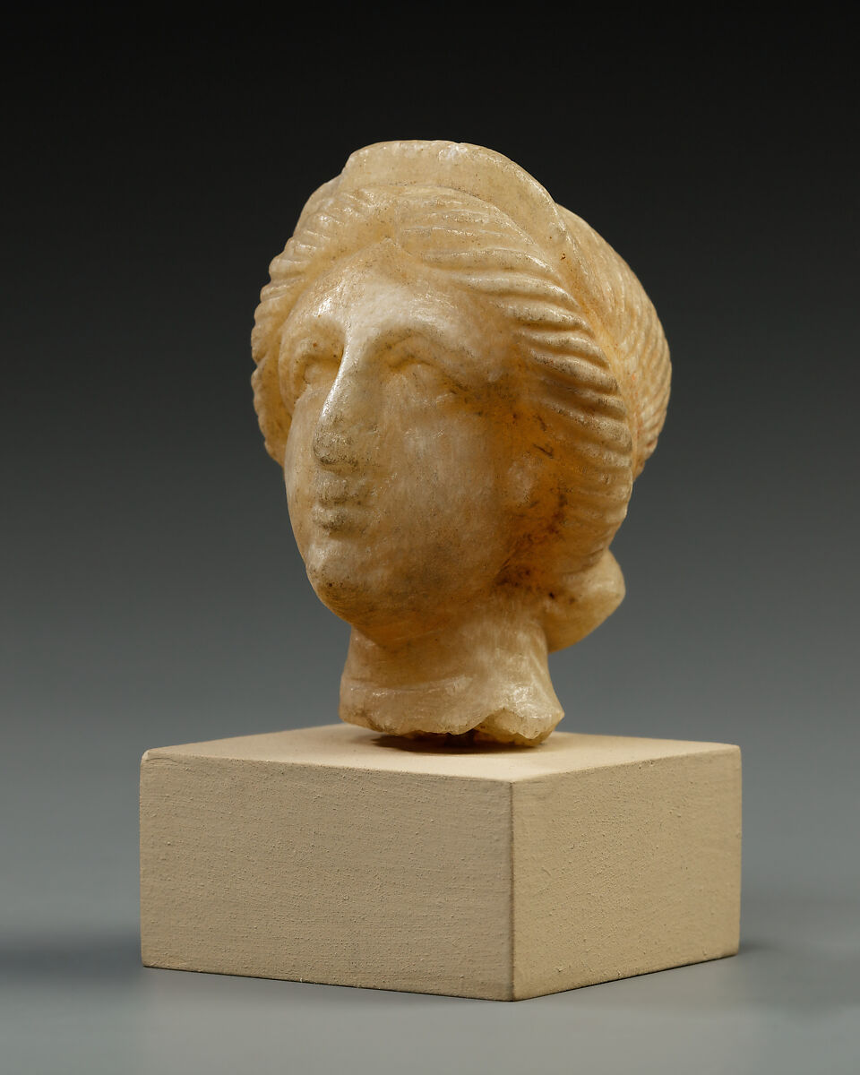 Head, female, Travertine (Egyptian alabaster)