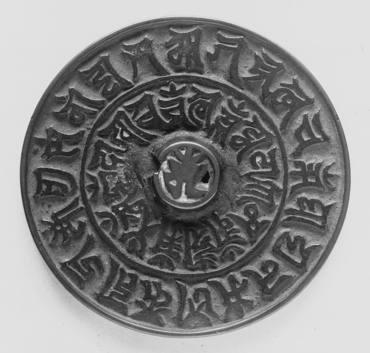 Mirror decorated with Sanskrit inscriptions, Bronze, Korea