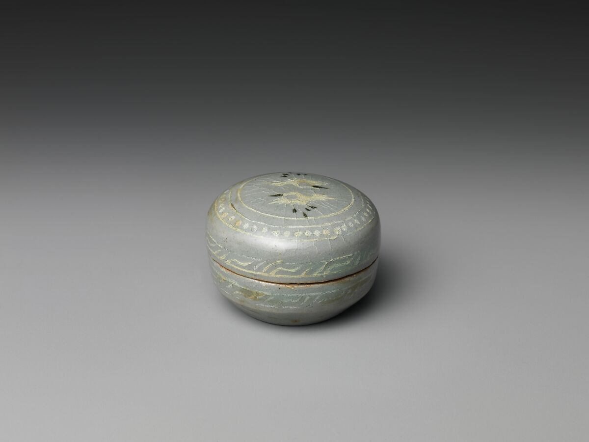 Box from set of five decorated with cranes and clouds, Stoneware with inlaid decoration of cranes and clouds under celadon glaze, Korea 