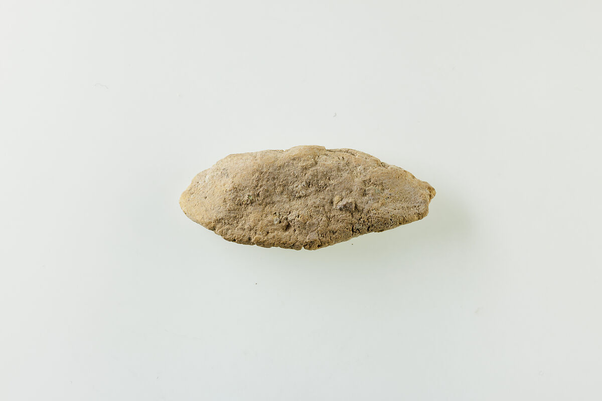 Fragment of clay lump with impressions of beads, Low-fired whitish clay 