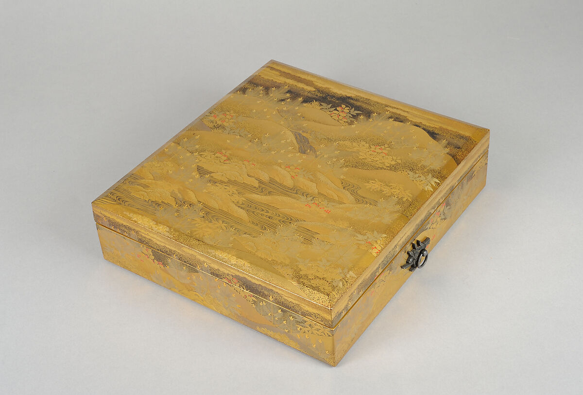 Box for Square Calligraphy Paper (shikishi-bako) with an Auspicious Landscape of Young Pines and Nandina Shrubs, Lacquered wood with gold, silver, red hiramaki-e, takamaki-e, cutout gold foil application on black and nashiji lacquer ground, Japan 