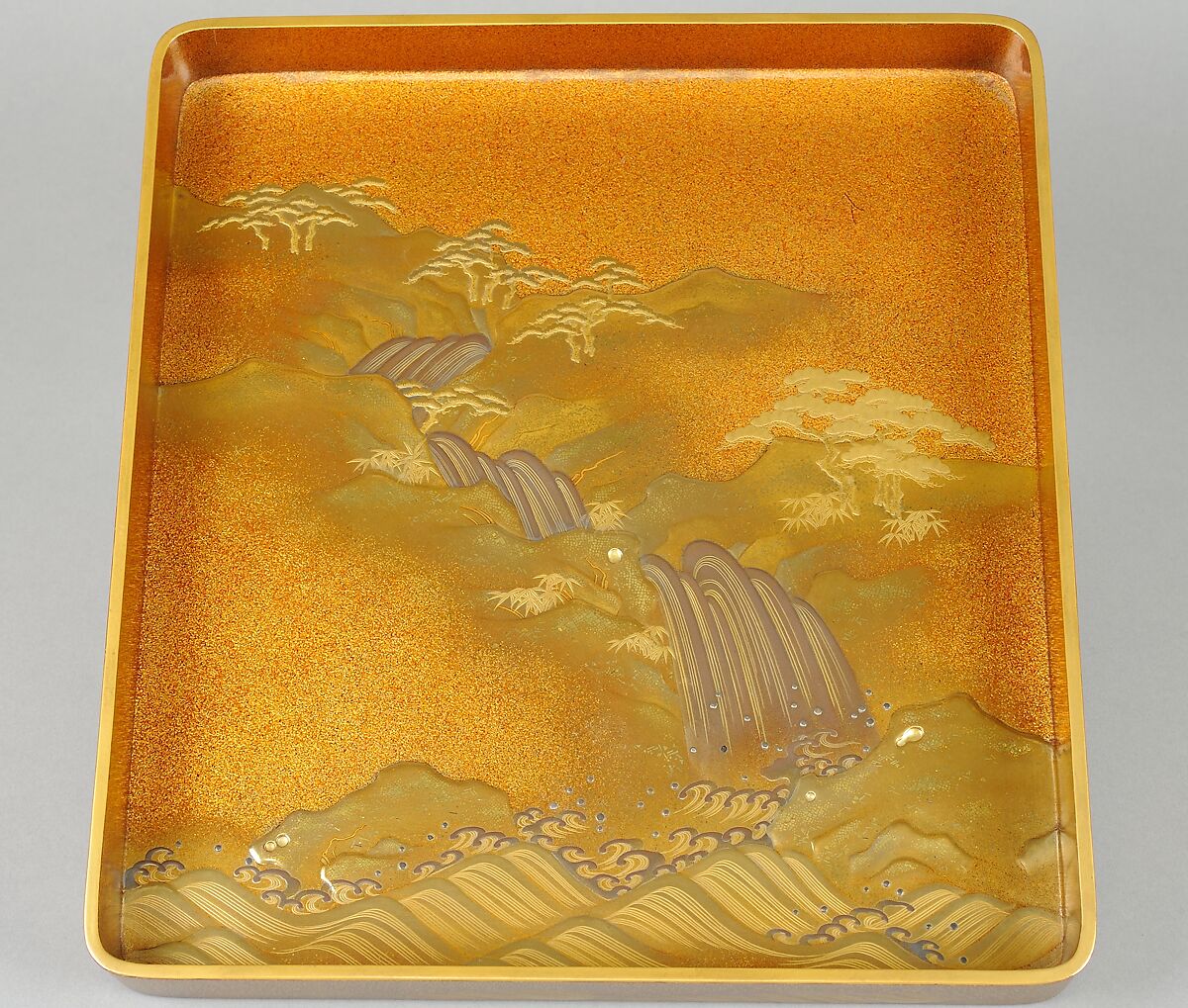 Writing Box (suzuribako) with Waterfall and Auspicious Characters, Lacquered wood with gold and silver takamaki-e, hiramaki-e, togidashimaki-e, and gold inlay on nashiji ground, Japan
