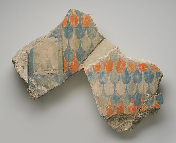 Relief fragment with feather pattern