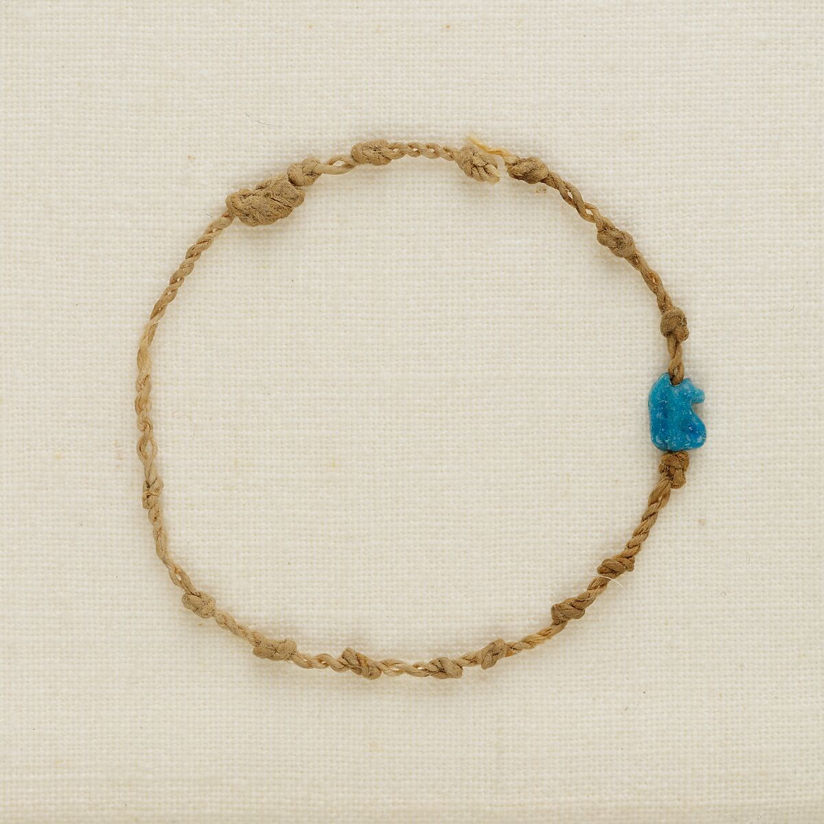 Bracelet with wedjat eye amulet, Linen, faience 