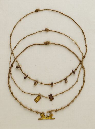 Necklace with 2 baboon amulets
