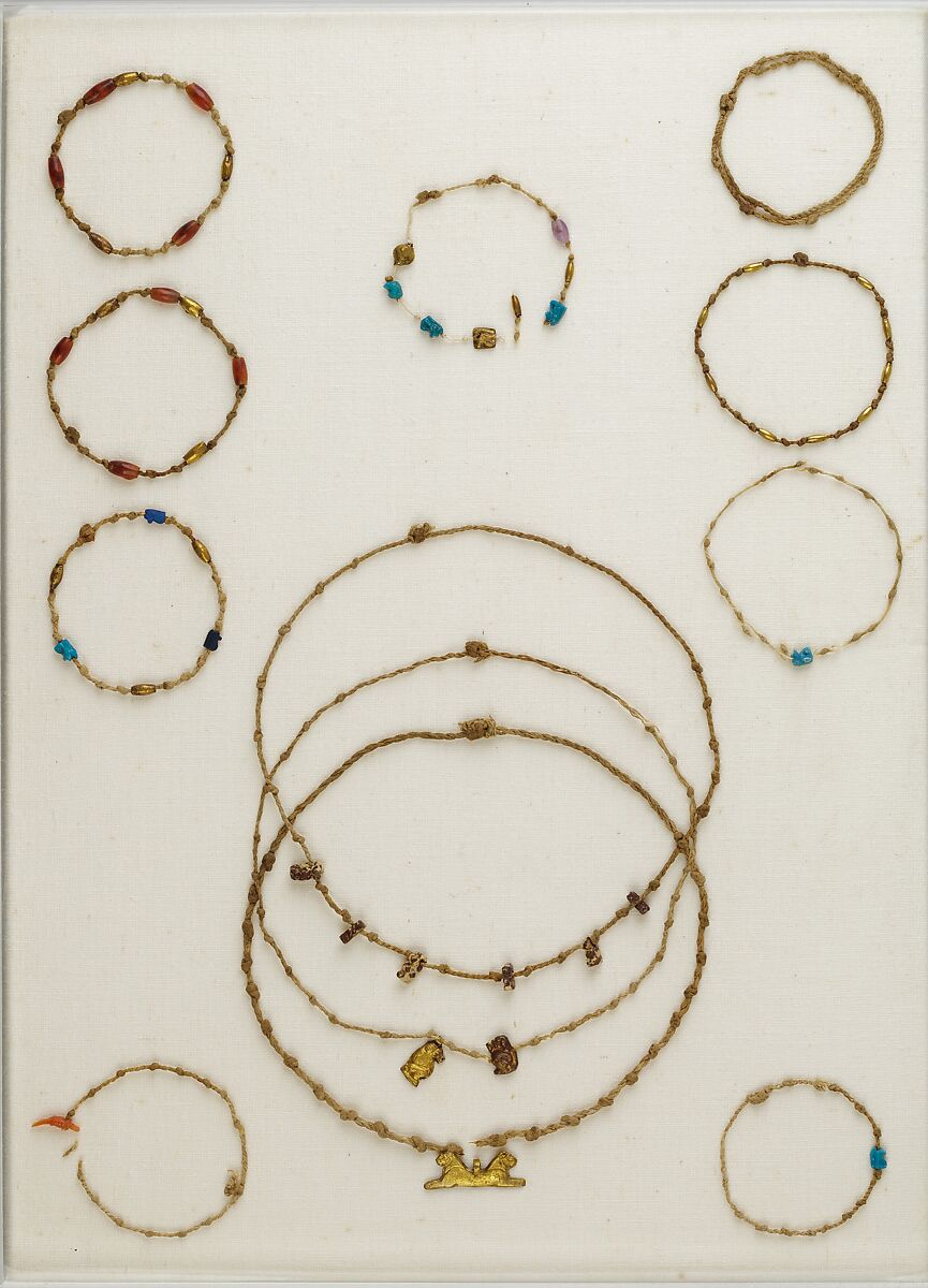Necklace with 6 Taweret amulets, Linen, breccia