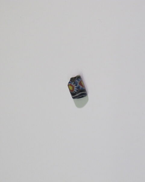 Bead with applied mosaic strips, Glass 