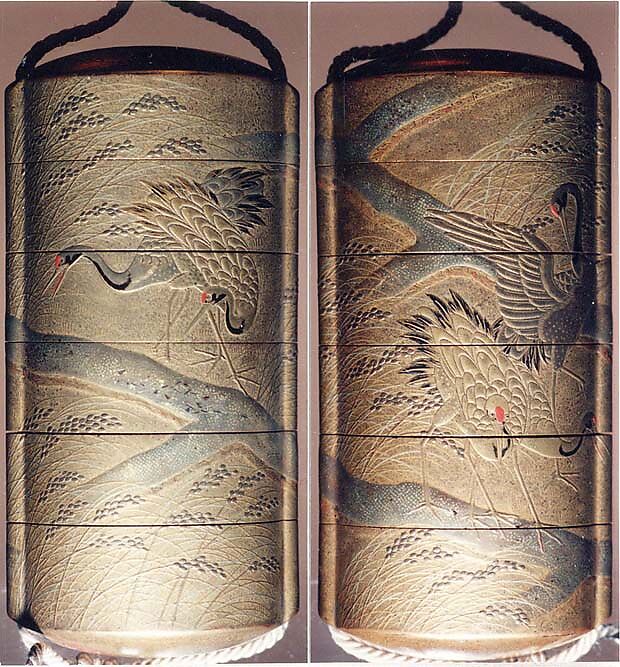 Inrō with Cranes in Rice Fields, Gold lacquer ground with gold and silver hiramaki-e and takamaki-e, red lacquer, and kirikane (cut-out foil)Ojime: bead; coralNetsuke: box with shells and seaweed; maki-e lacquer with gold and abalone-shell inlay, Japan 