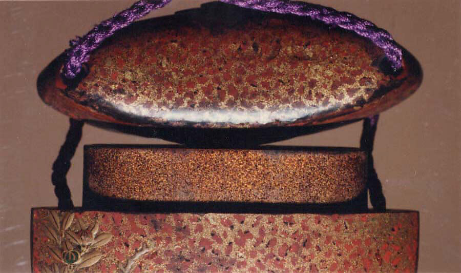 Case (Inrō) with Design of Various Flowers Growing beside Rocks and Fence, Lacquer, red and gyobu, gold and silver hiramakie, coral, raden, metal inlay; Interior: nashiji and fundame, upper case three-divided, Japan