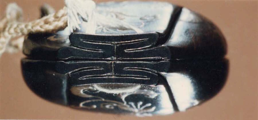 Case (Inrō) with Design of Nanban Flowers, Lacquer, dark wood, gold, silver, brown and green takamakie; Interior: plain, drawers, ivory handles, Japan