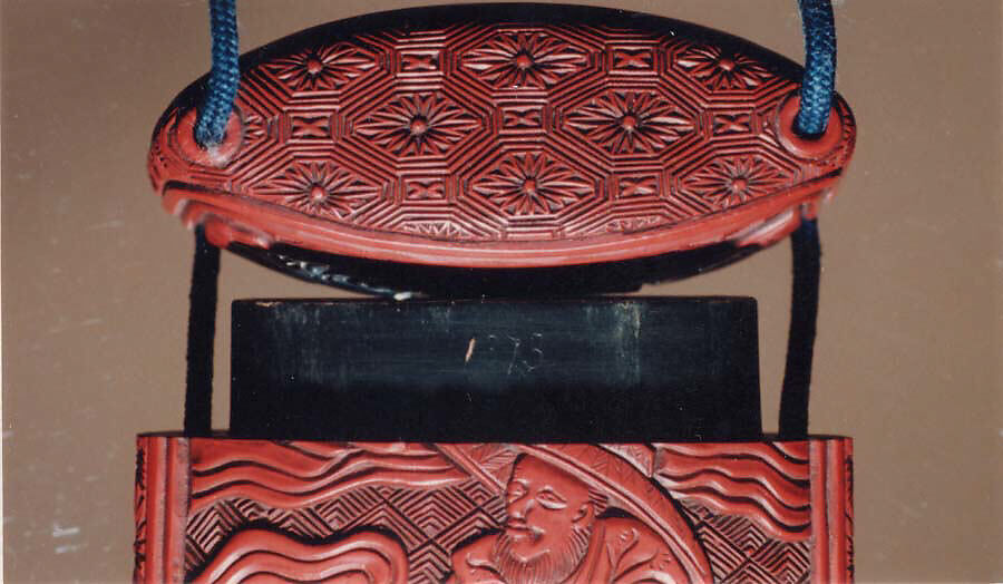 Case (Inrō) with Design of Elephant on Brocade Pattern (obverse); Person with Wide Hat and Hoe (reverse), Lacquer, carved tsuishu; Interior: roiro, Japan