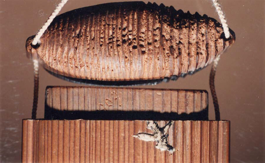 Case (Inrō) with Design of Samurai Seated on Ground (obverse); Bird Flying before a Crescent Moon (reverse), Lacquer, wood, stained ivory, raden, ceramic, various inlay; Interior: plain, Japan