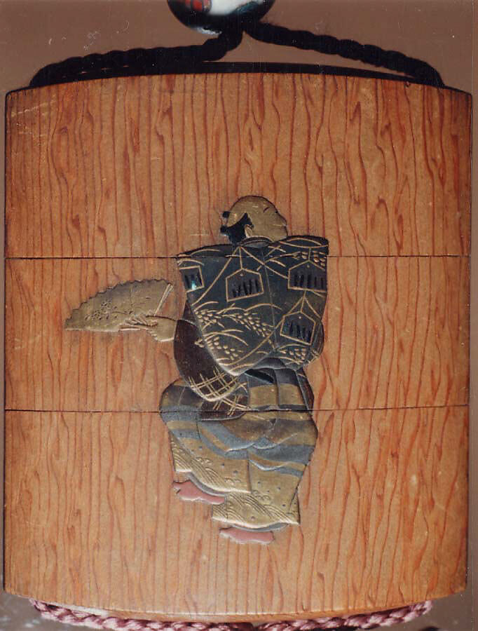Case (Inrō) with Design of Noh Dancer with Okina Mask (obverse); Noh Dancer with Fan (reverse), Light brown wood, gold and colored takamakie, aogai; Interior: plain, Japan