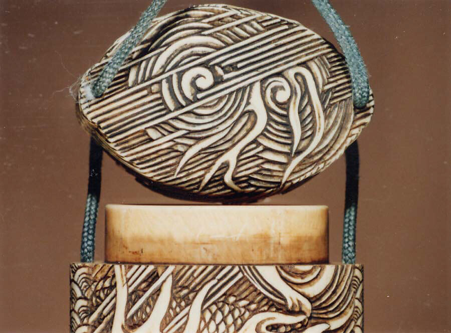 Case (Inrō) with Design of Three-Clawed Dragon in Rain and Swirling Clouds, Lacquer, ivory, carved relief, stained; Interior: plain, Japan