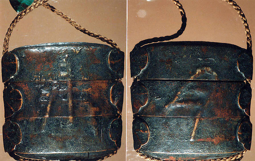 Case (Inrō) with Design of a Stylized Archaic Character in Relief, Lacquer, copper metal with dark patina, embossed relief, applied cord runners; Interior: black lacquer and metal, Japan 