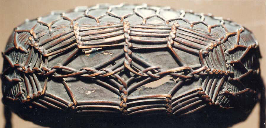 Basketry Inrō, Single case; plaited bamboo and rattan covered with lacquer (urushi) Netsuke: masks; wood, Japan