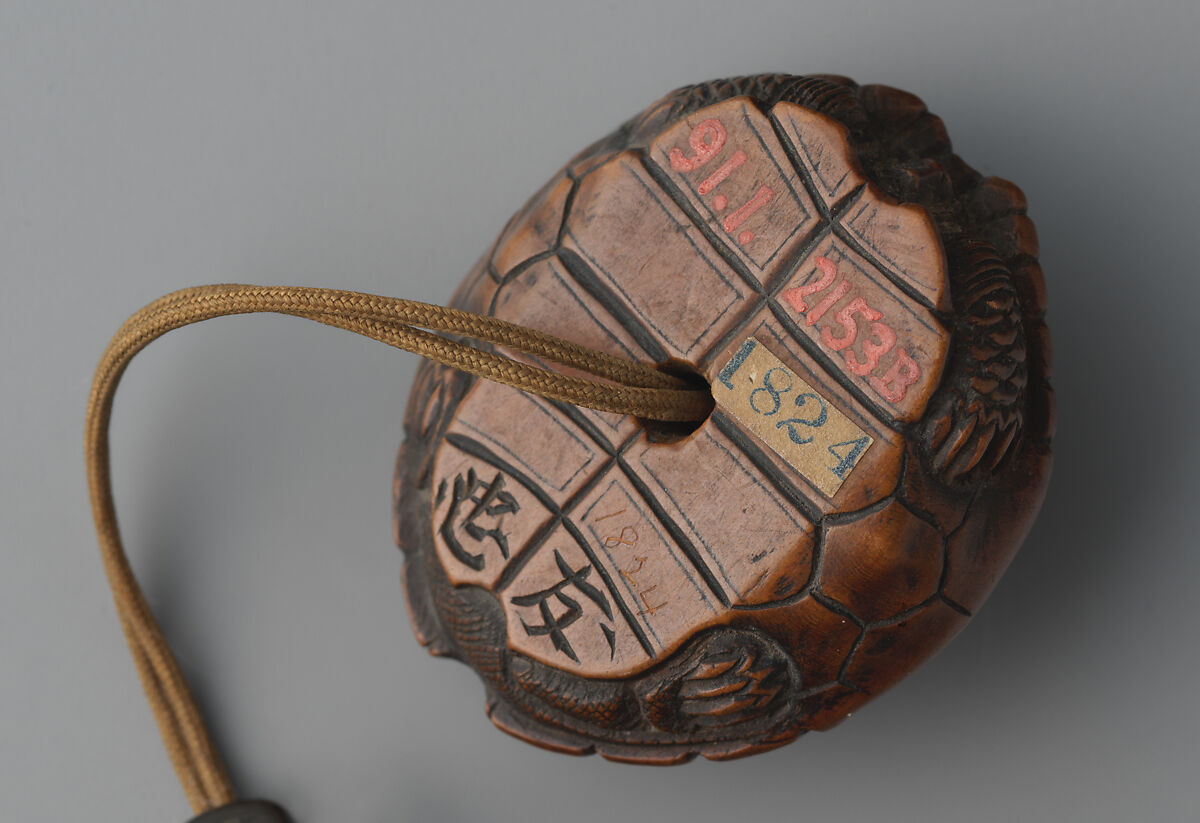 Tortoiseshell and Basketry Inrō, Inrō: single case; tortoiseshell under rattan “net” covered with lacquer (urushi); ojime: flower petals, brushwood; patinated copper with mixed-metal inlays; netsuke: turtle; carved wood, Japan
