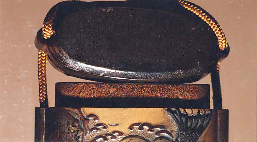 Case (Inrō) with Design of Dragonfish beside Rocks and Waves, Lacquer, fundame, roiro, gold, silver and brown hiramakie, applied metal; Interior: nashiji and fundame, Japan