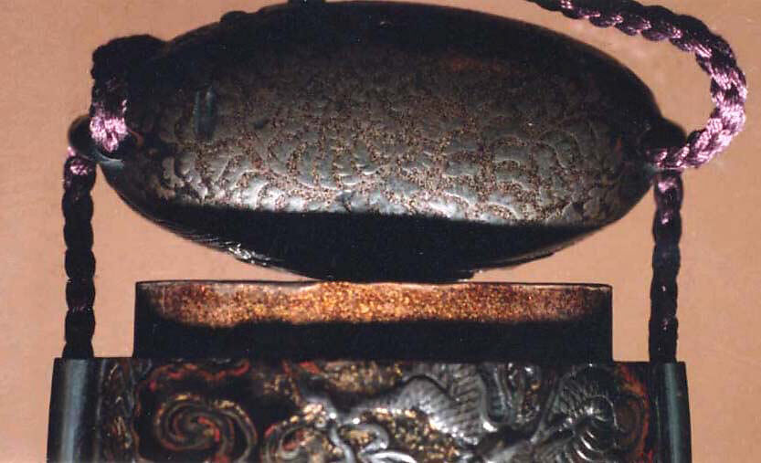 Case (Inrō) with Design of Dragon (obverse); Tiger (reverse), Lacquer, roiro, brown, black, red and gold hiramakie,  applied metal; Interior: nashiji and fundame, Japan