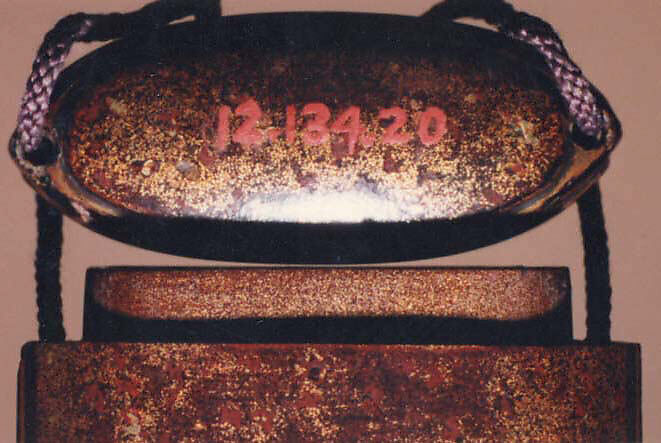 Case (Inrō) with Design of Large Kiri Mon (obverse); Two Brocade Pouches (reverse), Lacquer, dark brown, hirame, nashiji, black, red and gold hiramakie, takamakie; Interior: nashiji and fundame, Japan