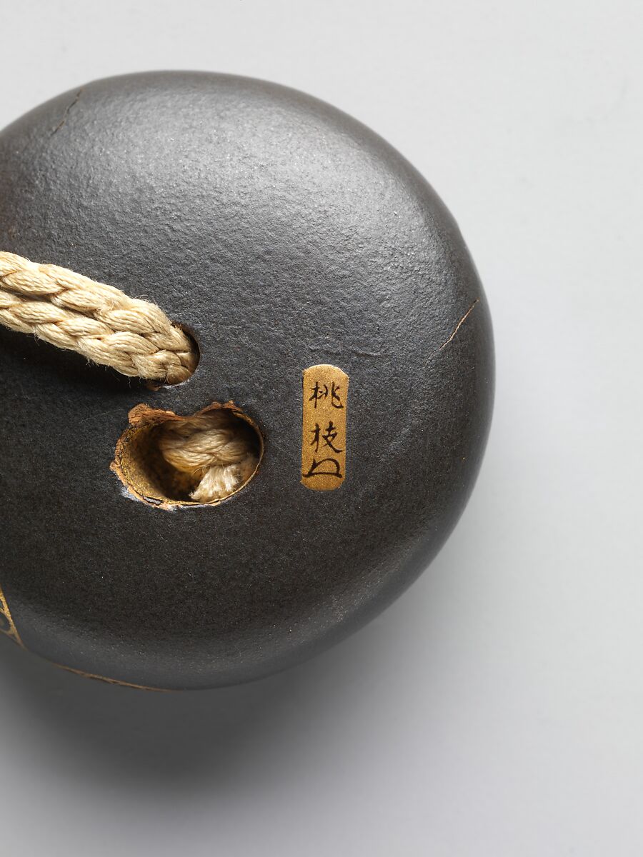 Case (Inrō) with Design of Cicada on Tree Trunk, Case: gold and metal on black lacquer with mother-of-pearl inlay; Fastener (ojime): coral; Toggle (netsuke): lacquer medallion with design of chrysanthemums and the Chinese character for longevity, Japan