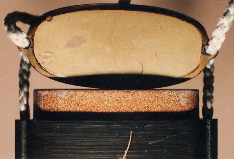 Case (Inrō) with Object from the Noh drama "Hachinoki", Gold lacquer inlaid with mother-of-pearl on a black lacquer ground
Ojime: Amber bead in shape of a vase
Netsuke: Boxwood carved with "mother and child" mice and an eggplant, Japan