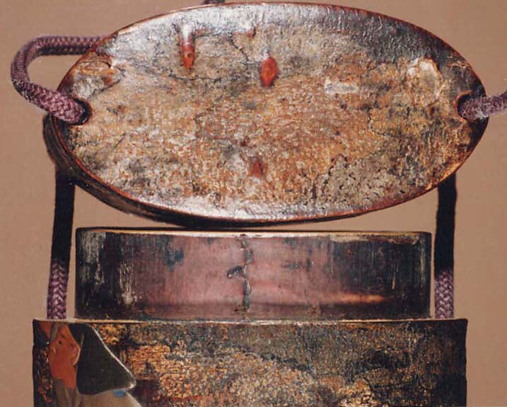 Case (Inrō) with Design of Monkey Trainer and Seated Monkey on Leash (obverse); Bundle, Hat, Sticks and Staff (reverse), Lacquer, cherry bark, gold and colored hiramakie, takamakie; Interior: plain and fundame, Japan