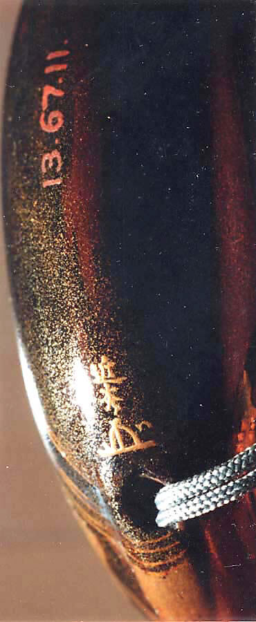 Inrō with Tiger Drinking from a River beside Rocks and Pine Tree, Two cases; lacquered wood with gold and silver togidashimaki-e, hiramaki-e, takamaki-e, cut-out gold foil application on black groundNetsuke: bat; carved walrus ivoryOjime: coral bead, Japan