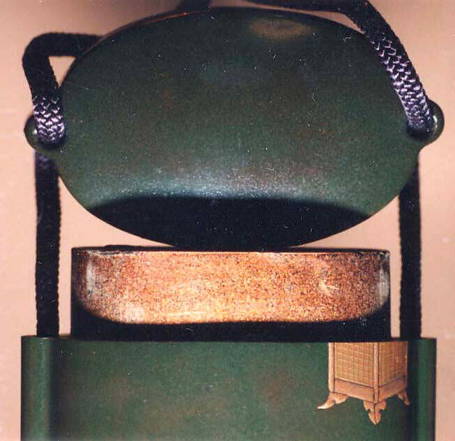 Case (Inrō) with Design of Deer and Lanterns at Kasuga Shrine, Yamada School, Gold and silver maki-e and pewter on dark green lacquer
Ojime: Coral bead
Netsuke: Carved wood in shape of mouse on mushroom, Japan