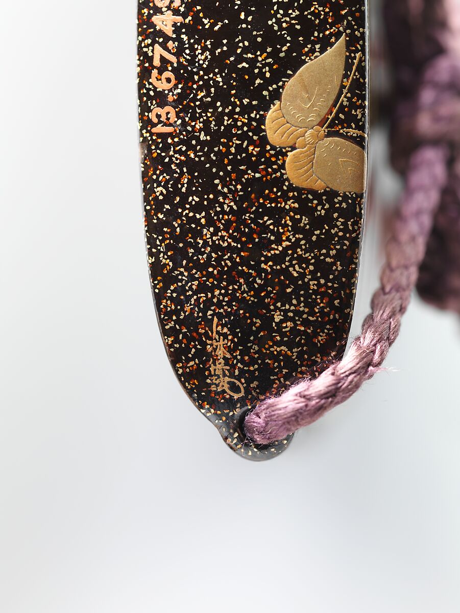 Inrō with “Chrysanthemum Youth” (Kikujidō), Three cases; lacquered wood with togidashimaki-e imitating ink painting (togikirimaki-e) on gold and black lacquer groundNetsuke: purple and green ceramic shishi (Chinese lion)Ojime: inlaid metal with fruit basket , Japan