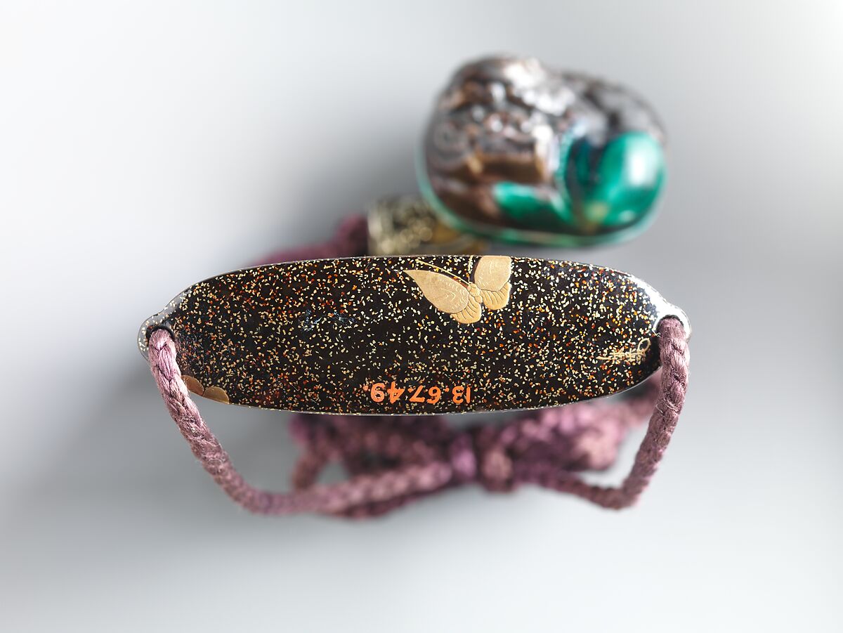 Inrō with “Chrysanthemum Youth” (Kikujidō), Three cases; lacquered wood with togidashimaki-e imitating ink painting (togikirimaki-e) on gold and black lacquer groundNetsuke: purple and green ceramic shishi (Chinese lion)Ojime: inlaid metal with fruit basket , Japan