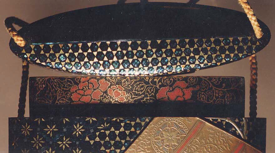 Inrō with Carp Hanging Scroll and Characters, Kōami Chōkō (Japanese, active second half of the 18th century), Three cases; lacquered wood with gold and silver takamaki-e, hiramaki-e, togidashimaki-e, gold foil cut-outs, and mother-of-pearl inlay on black groundNetsuke: kagamibuta with Shōjō designOjime: agate bead, Japan