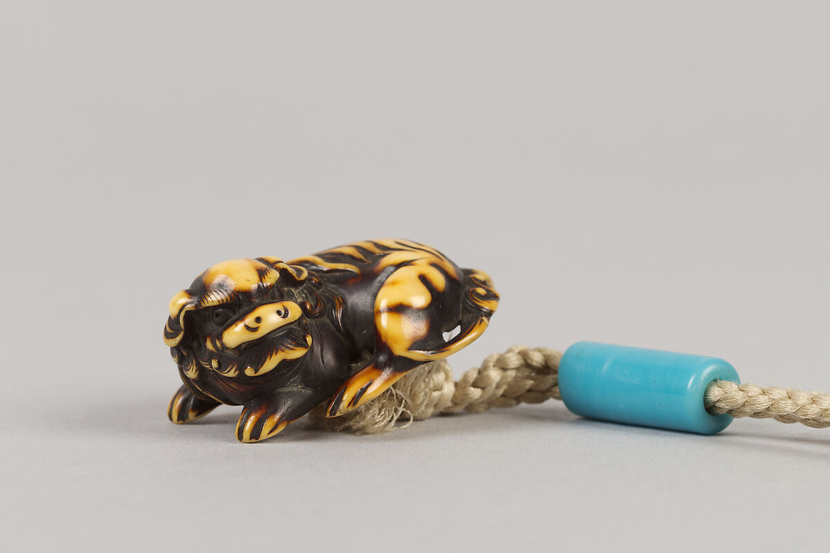 Case (Inrō) with Design of Dog (Shishi) with Brocade Ball, Lacquer, kinji, brown ishime, incised, takamakie, roiro and togidashi, metal inlay; Interior: nashiji and fundame, Japan