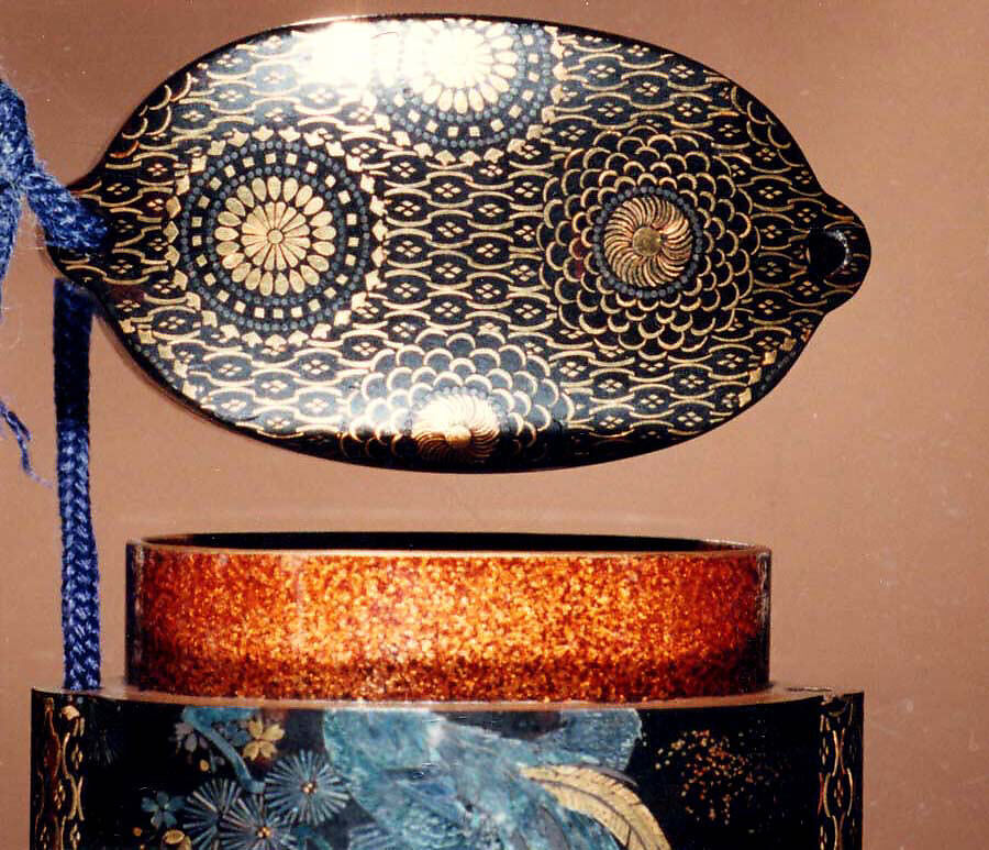 Case (Inrō) with Design of Pine and Cherry Tree (obverse); Rooster and Hen on a Drum (reverse), Black lacquer inlaid with gold foil and mother-of-pearl, Japan