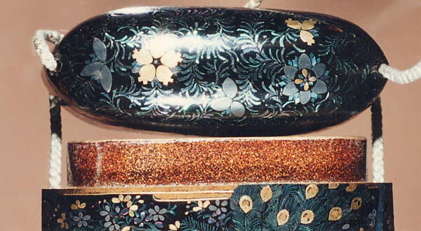 Case (Inrō) with Design of Peony and Cherry Tree (obverse); Peacock (reverse), Aogai shell and gold foil inlay on black lacquer, Japan