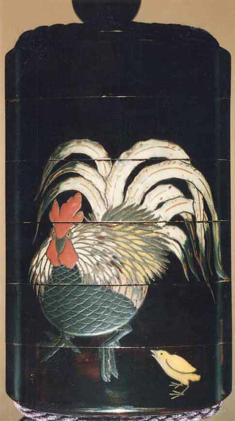 Inrō with Rooster, Hen, and Chicks, Black lacquer ground with white, green, yellow, and red lacquerNetsuke: dancer; carved woodOjime: yellow and red glass bead, Japan