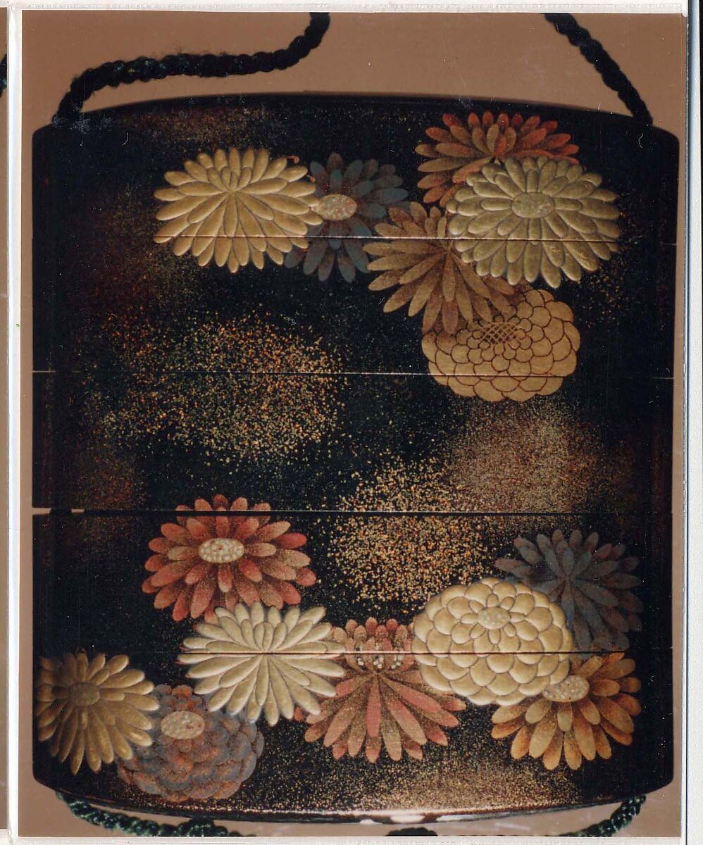 Inrō with Scattered Chrysanthemums, Four cases; lacquered wood with gold, silver hiramaki-e, togidashimaki-e, red lacquer, muranashiji on black lacquer ground; Netsuke: ivory and metal, kagamibuta type; crossing boat; Ojime: metal bead, Japan