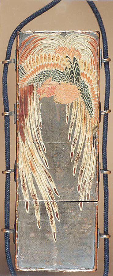 Case (Inrō) in the Shape of Wood Seal with Decoration of Pheonix and Paulownia Tree, Lacquer with red, black green, brown, and white painted lacquer 
on gray ground
Ojime: kingfisher on lotus stem; wood, stained ivory and mother-of-pearl inlay
Netsuke: yamabushi and wood gatherers, Japan