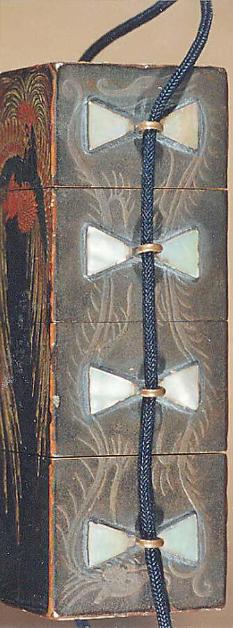 Case (Inrō) in the Shape of Wood Seal with Decoration of Pheonix and Paulownia Tree, Lacquer with red, black green, brown, and white painted lacquer 
on gray ground
Ojime: kingfisher on lotus stem; wood, stained ivory and mother-of-pearl inlay
Netsuke: yamabushi and wood gatherers, Japan