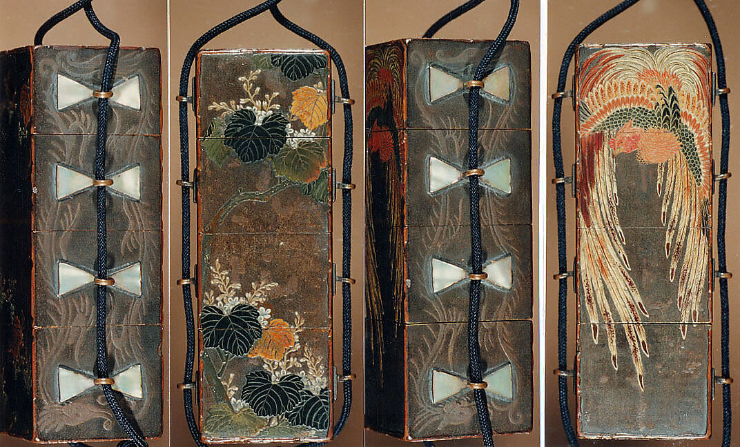Case (Inrō) in the Shape of Wood Seal with Decoration of Pheonix and Paulownia Tree, Lacquer with red, black green, brown, and white painted lacquer 
on gray ground
Ojime: kingfisher on lotus stem; wood, stained ivory and mother-of-pearl inlay
Netsuke: yamabushi and wood gatherers, Japan 