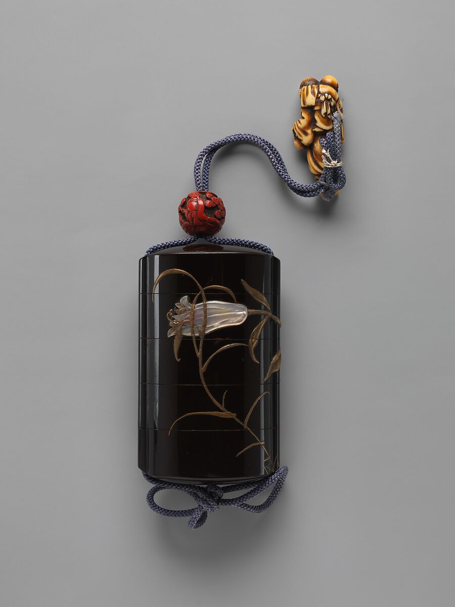 Case (Inrō) with Design of Grasshopper on Stalk of Flowering Lily, Nomura Chōkei (dates unknown) (Japanese), Case: Powdered gold (maki-e) on black lacquer with mother-of-pearl, pewter, and ceramic inlays; floral decoration on risers in incised gold; Fastener (ojime): carved red lacquer with design of Chinese sage and pine; Toggle (netsuke): stained ivory carved in the shape of a farm woman and child (signed: Homin), Japan