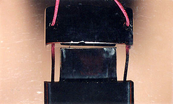 Case (Inrō) with Design of Daruma (obverse); Panel with Inscription (reverse), Lacquer, roiro, black hiramakie, takamakie, incised, coloured pottery inlay; Interior: roiro and fundame, Japan