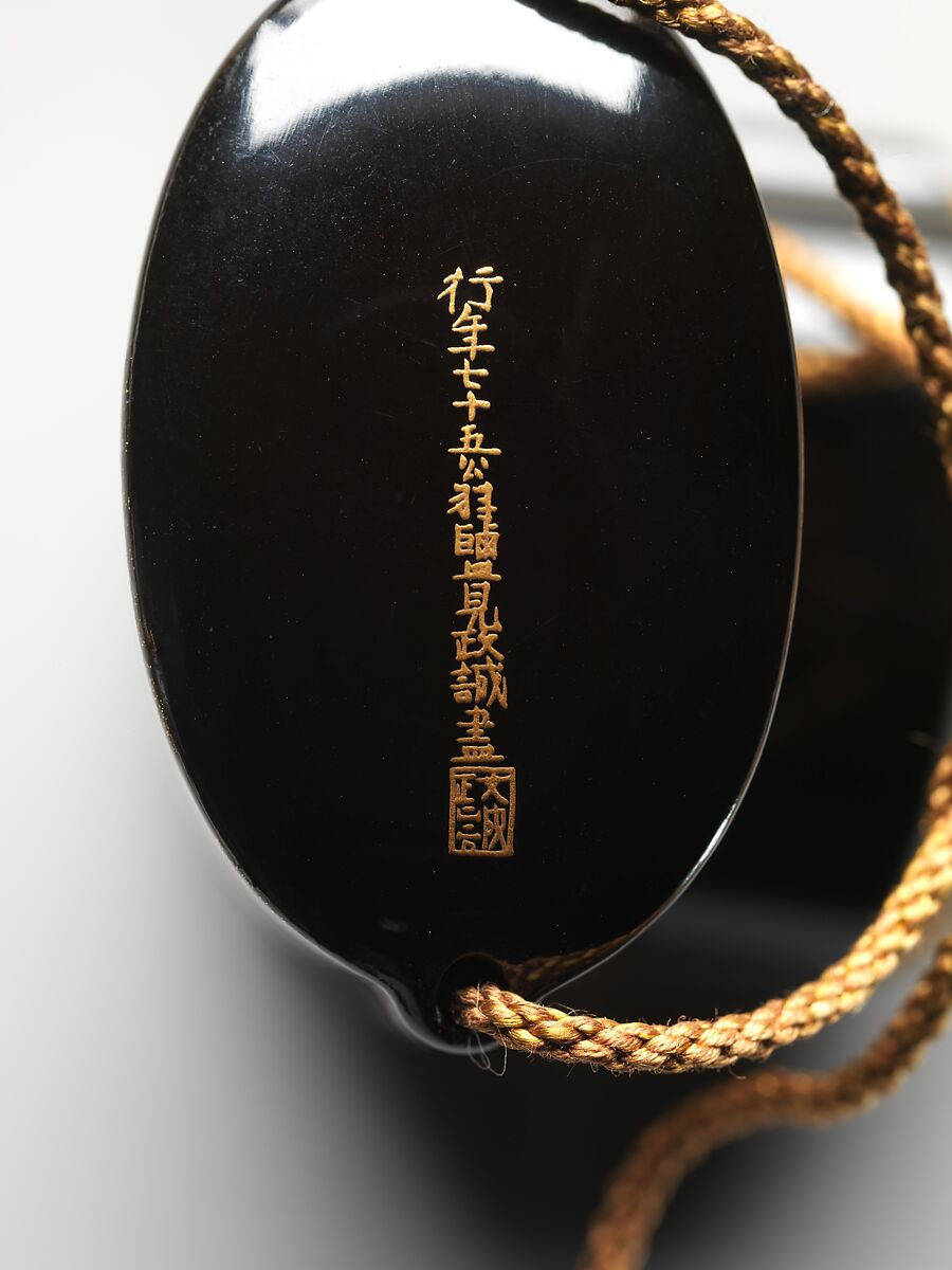 Inrō with Owl and Crows in Tree, Black lacquer ground with gold and silver togidashi maki-e and e-nashijiNetsuke: seal-shaped with sheaf of rice around peony with pecking bird; ivoryOjime: woven ball; caved and pierced bone, Japan
