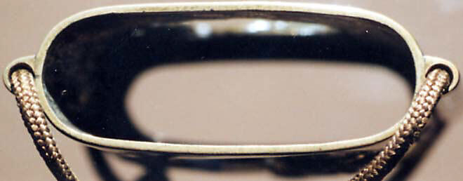 Case (Inrō) with Design of Sage beside a Waterfall (obverse); Tiger beside Rocks and Maple Tree (reverse), Metal, brass, sentoku metal, incised, openwork, various applied metals
Interior: silver metal, Japan