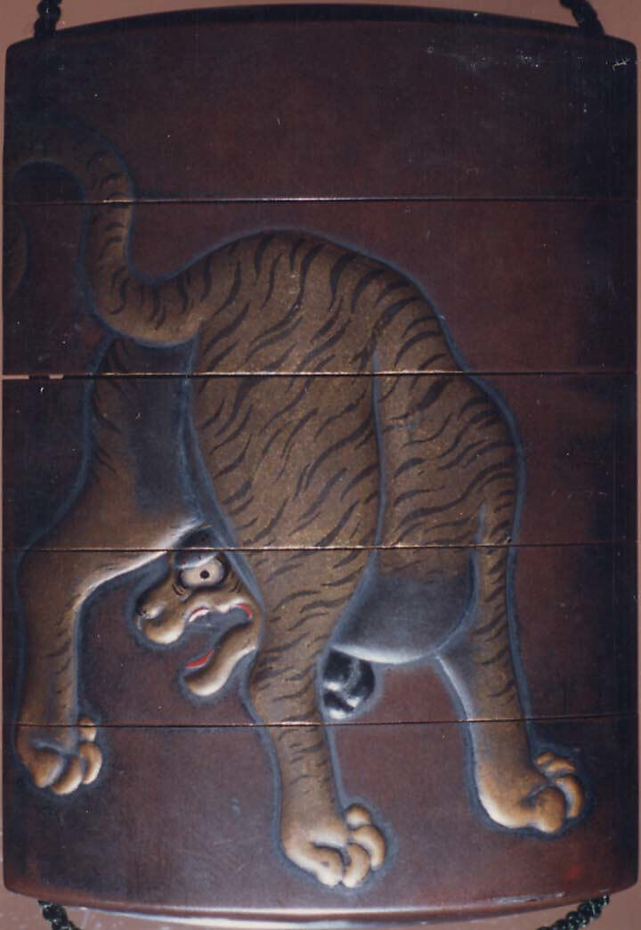 Case (Inrō) with Design of Tiger Seen from Behind, Lacquer, shibuichi coloured ground, gold, silver and red hiramakie, inlaid eye; Interior: red lacquer & silver fundame, Japan