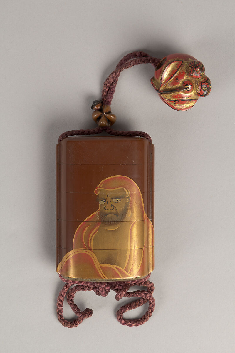 Case (Inrō) with Design of Daruma (obverse);  Fly Whisk (Hossu) (reverse), Lacquer, tan, brown ground, gold, black and red togidashi; Interior: nashiji and fundame, Japan 